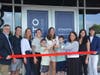 Kyla Scott, center, the owner of the new Athleto Pilates studio in Fairfield, cuts a ribbon with First Selectperson Christine Vitale at the 340 Grasmere Ave. location.