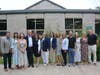 Gov. Ned Lamont (fourth from the left), First Selectperson Christine Vitale (fifth from the left) and state and local officials Monday at the announcement of Fairfield's 75 percent reimbursement from the state for the Dwight Elementary School rebuild.