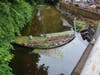 The litter-collecting boom that was recently installed in the Rooster River in Fairfield.