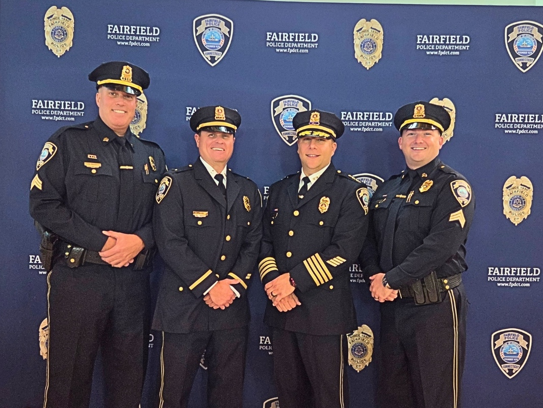 From left, Fairfield Police Sgt. Kevin Wells, Lt. Eric Fuller, Chief Michael Paris, and Sgt. Phil Galaske at Tuesday's promotional ceremony.