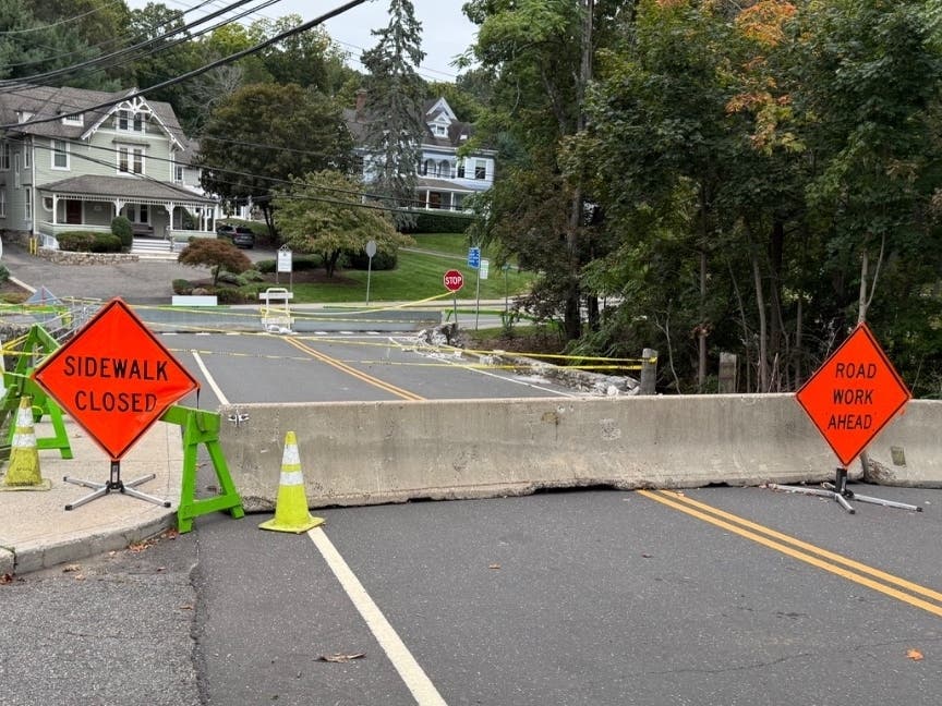 The Jesup Road bridge at Imperial Avenue in Westport remains closed after Sunday's heavy rainstorm and flooding.