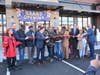 The ribbon-cutting at the new Steelpointe Harbor gas station, car wash and convenience store in Brigeport.