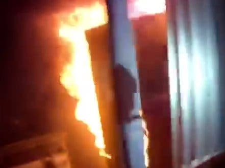 A firefighter's vantage point inside a burning building.