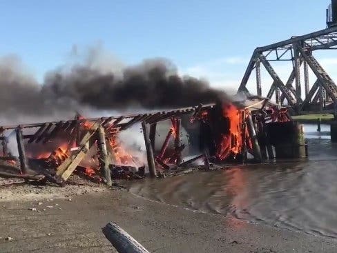 A vegetation fire spread to the train trestle over San Francisco Bay