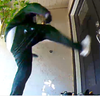 Suspect kicks in a door during a burglary in Pleasanton.