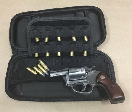 A gun and ammunition seized in Fremont.