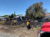 Firefighters put out the flames before reaching the homes.