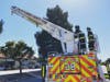 Alameda County firefighters on Truck 28 in Newark.