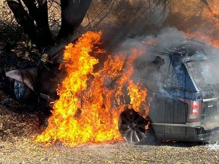The driver had to be pulled through the window to safety.