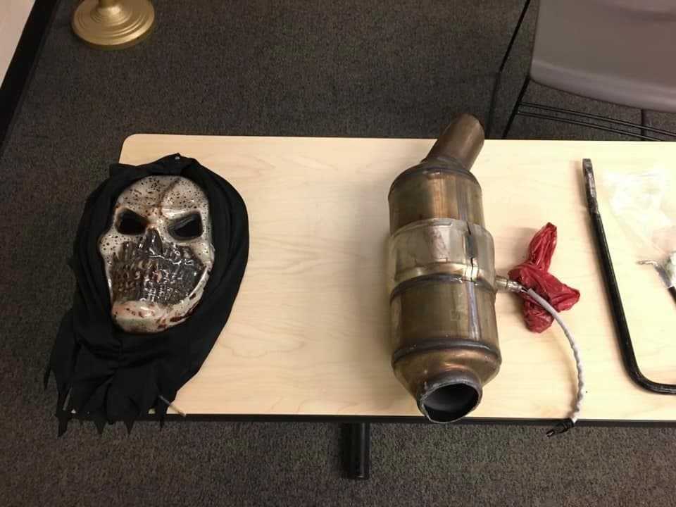 Items recovered during a search of the suspects' vehicle, including a stolen catalytic converter.