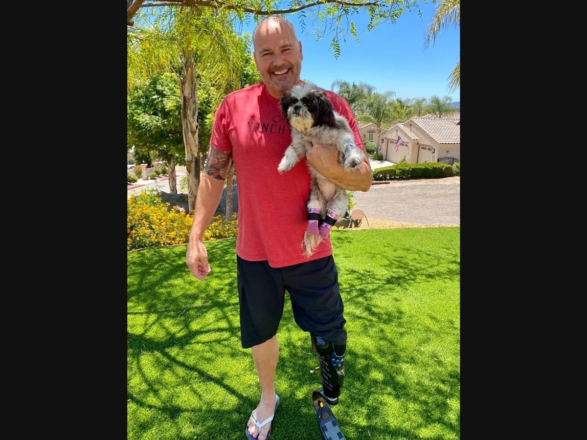 Detective James "Chappie" Hunter adopted Chloe, a 9-year-old Shih Tzu, who underwent a partial amputation of both of her back feet.
