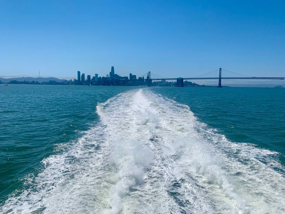 San Francisco in the distance from a ferry boat on San Francisco Bay.