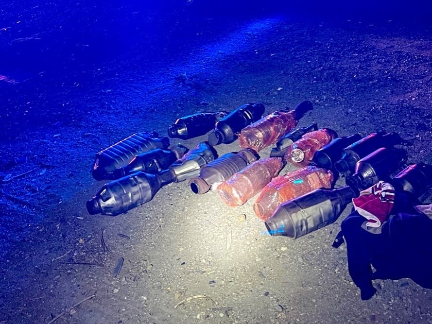 This SLPD evidence photo shows 16 catalytic converters. Now police hope to match them to victims.
