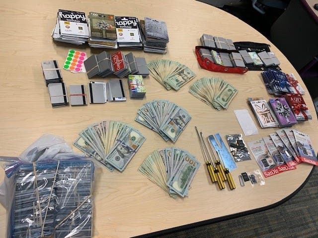 Fremont Police display items seized during an ATM skimming investigation.