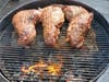 Meat on the grill at Lee Thomas' new home-based restaurant.  