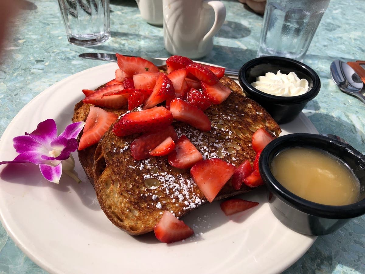 Don't skip breakfast! How about french toast with fresh strawberries, homemade syrup, and whipped butter?