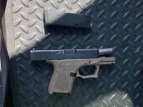 One of the guns recovered by police. No injuries were reported in either shooting.