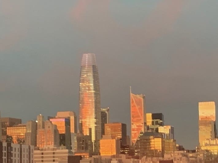 Orange glow on San Francisco skyscrapers just after sunset.