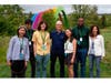Apple’s 2022 Swift Student Challenge Winners Pose with CEO Tim Cook at Apple Park. (Left to right): Angelina Tsuboi, Aditya Mangalampalli, Joshua Tint, Apple CEO Tim Cook, Audrey Wang, Jones Mayes II, Apple VP of Product Marketing Susan Prescott