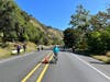 Pat Bernstein rides through Niles Canyon without fear of being hit by a car. Pedestrians were also enjoying the road.