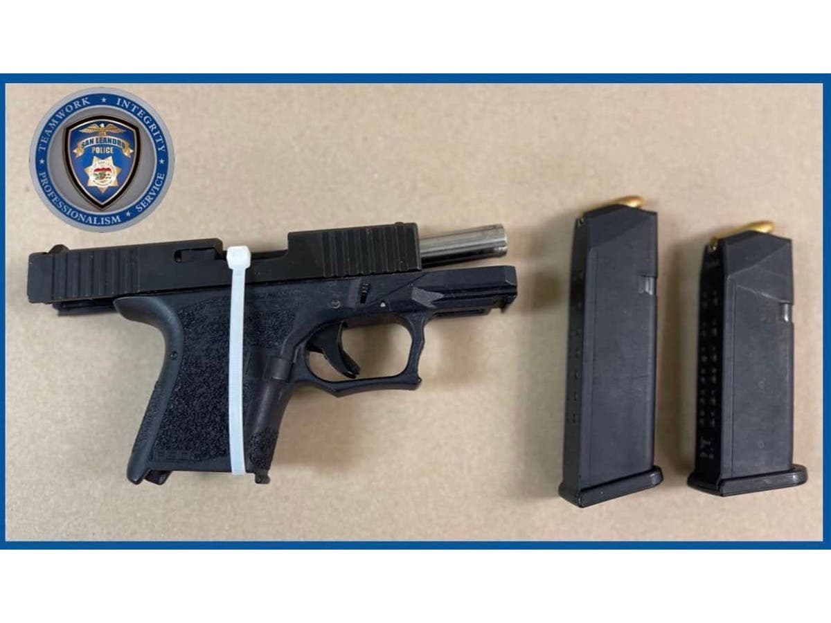 Gun and extended magazine seized by an officer during a traffic stop.