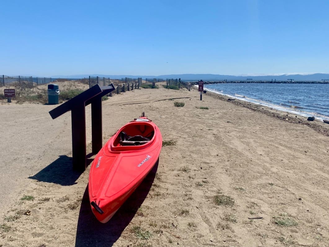 An empty canoe on the beach, Alameda, Calif.
