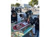 Prologis volunteers paint a Habitat for Humanity playhouse.