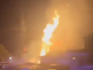 Flames seen from the window of an Alameda County fire truck as it arrived at a Newark fire.