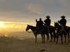 Horses and riders atop Five Canyons at sunset, Castro Valley, Calif.