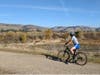 A child rides a bike at Quarry Lakes Regional Recreation Area in Fremont, Calif, Dec. 2022.