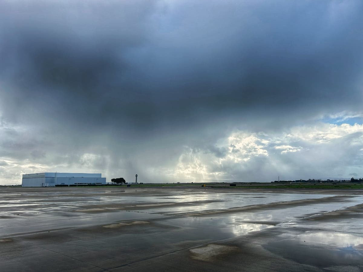 Storm clouds pass over Oakland International Airport.