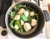 Turnip root and greens, ready to cook in San Leandro, Calif.
