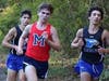 Junior Cory Chambers racing towards a individual state qualifying finish at the Region 5-7A meet to lead the Milton boy's team.