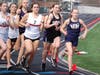 Farrah Frith (#1) leads the early stages of the 1600m where her winning time of 5:18.00 is now the 8th best ever in school history.