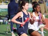 Senior Genevieve Trainor takes the lead during her leg of the 4x800m Relay at the Roswell relays meet.