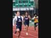 Senior Devin Dahunsi runs the 4x100m relay at the Roswell relays.