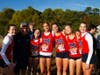 Varsity Girls team just after their race: (l-r, senior captain Farrah Frith, Coach Andy Carr, junior Emerson Armistead, junior Calista Cacciatore, senior Emmaline Kelley, senior Sydney Anderson, junior Ella Grace Malcom)