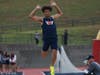 Double region champion! Senior captain Devin Dahusi leaps to the long jump title!