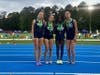 Girls 4x800m relay after their awards ceremony for 6th place. l-r are senior captain Sydney Anderson, juniors Emerson Armistead & Leelah Dennis & senior captain Emmaline Kelley.