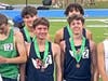 Milton's 4x800m relay on the awards stand after their 5th place finish and school record (7:54.98) performance. 1st row l-r, senior Brandon Sevel, junior Luke Erbey, back row, senior Andrew Ramsey & junior Zach Patell.