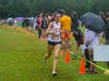 Milton freshman Maisie Wilderspin on her way to a 4th place finish in the varsity girls race at the 13th Milton Invitational.