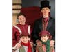 The Cratchit Family. Mrs. Cratchit, Alyssa Moore, with Tiny Tim, Jacob Moore and Bob Cratchit, Lee Damon, with Tiny Tim, son Ryker Damon. 