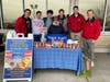 Diane Bonanno with the Rutgers Men's Crew Team - Collecting cans of soup