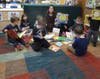 Discovery Preschool at Kangaroo Kids help sort the donated books