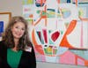 Marie Anthony with her award winning painting; "Still Life in Pink."