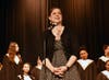 Claire Jakubisin, Choir Director for Marian Catholic welcomes guests to the first Black History Month Concert