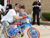 One of the winners of the bikes during the 32nd Annual Commissioners Park Bike Rodeo