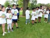 Kids wait to see if they won a bike during the 32nd Annual Commissioners Park Bike Rodeo