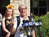 Sister Mary Jo speaks to the media at Marian Catholic High school before leaving for the airport. 
