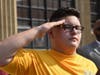 Saluting during Bloom high school's annual 9/11 ceremony is Dominic Rodriguez from Chicago Heights 